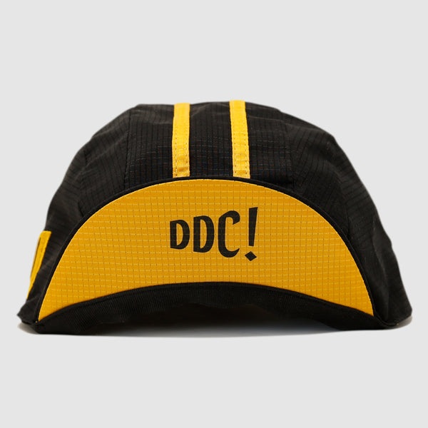 Black and yellow cycling cap